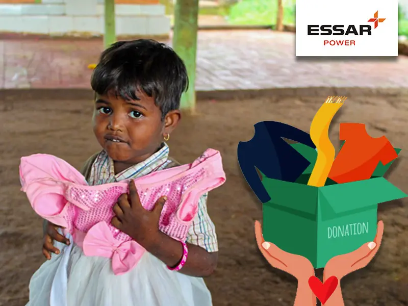 Essar-Power-Hazira-donates-clothes-sweets-to-villagers